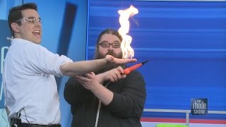 Flaming bubbles with '(MAD) Science Fair'