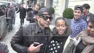 Sean Paul greets fans outise the Sers hotel in Paris