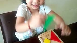 How to Play Tangram Puzzle- Cute Kid Explaining| Tangrams: A learning tool for building STEM skills