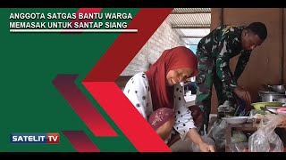 ANGGOTA SATGAS BANTU WARGA MEMASAK UNTUK SANTAP SIANG