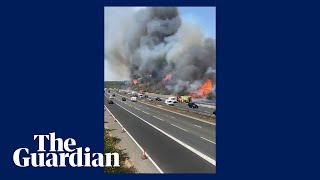 Huge grassfire breaks out next to motorway on Dartford Heath after temperatures soar