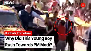 Boy Breaks Barricade To Offer Garland To PM Modi At Hubballi Roadshow | PM Modi Karnataka