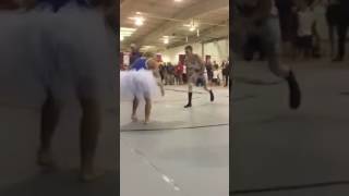 Bride and groom wrestling match