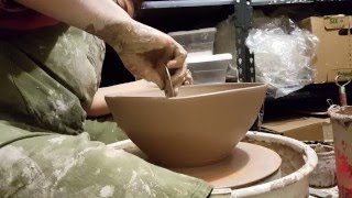 Throwing a large bowl on the pottery wheel