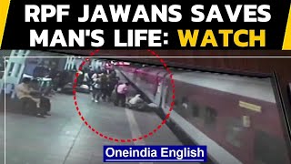 Maharshtra: Brave RPF personnel save life a man who fell while boarding a train | Oneindia News