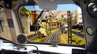 Cab ride over large private Märklin k-track model railroad layout: From Lower Bavaria to Switzerland