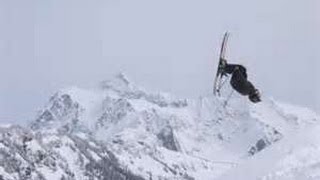 Skier does backflip while chased by avalanche