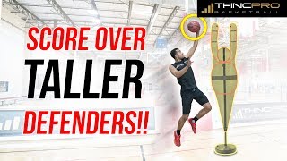 How to: Score Over Taller Defenders!!! (Make Lay Ups Over Taller Defenders)