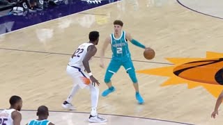 LaMelo Ball dances on Deandre Ayton then blows by for the two handed jam