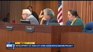 Development company sues city over Judge Doyle Square project