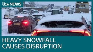 Travel disruption continues as heavy snowfall heads east | ITV News