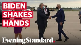 Joe Biden seen shaking hands on arrival in Wisconsin
