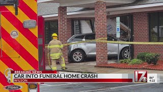 Car crashes into funeral home in Wilson