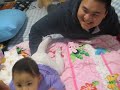 baby crawling with her dad.