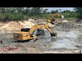 Cat323Gc & Komatsu pc200-10CE Join hands to move the soil onto the pile of stock.