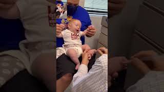 Doctor distracts baby from his shots with Goofy tune