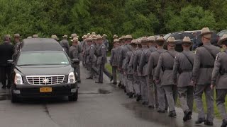 Hundreds of law enforcement officials mourn fallen trooper