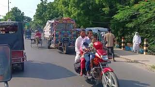 চাঁপাইনবাবগঞ্জ মহানন্দা সেতু টোল নিচ্ছে কি ভাবে দেখুন। মহানন্দা সেতুর দুই ধারে পতাকা পতপত করে উড়ছে।