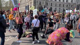 XR folk dancing in Parliament square and Whitehall.