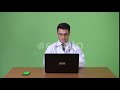 Young Handsome Hispanic Man Doctor Against Green Background | Stock Footage - Videohive