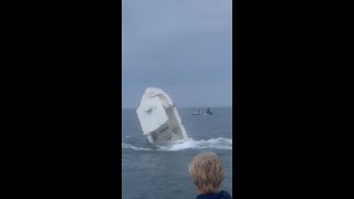 Shocking moment whale crashes into fishing boat