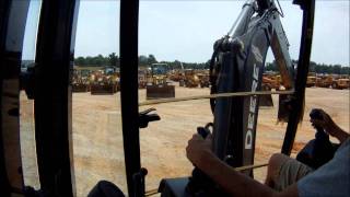 John Deere 410J backhoe