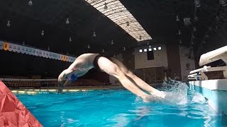Backstroke start in super slow motion. Backcrawl olympic start