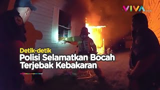 HEROIK! Aksi Polisi Selamatkan Bocah dari Kebakaran Rumah