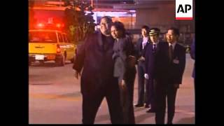 US Secretary of State arrives, greeted by sumo wrestler