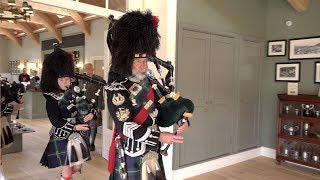 Lonach Pipe Band March through the new Braemar Highland Games Centre \u0026 Pavilion in Scotland