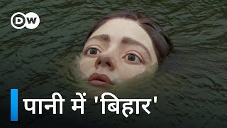 डूबती हुई 'लड़की' ने मचाई हचलच [Drowning girl statue causes a stir in Spain's Bilbao]