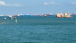 Sea with beautiful ships in Singapore(సింగపూర్‌  సముద్రం లో అందమైన ఓడల) #singapore #sea #ship #trave