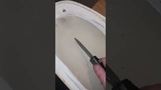 Using a toilet to reshape a knife with a broken tip