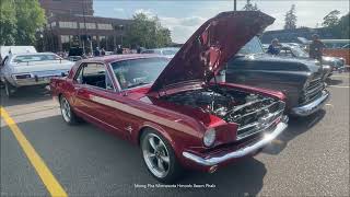 A Dark Red 1965 Ford Mustang Coupe