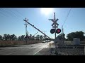 up 7805 high speed intermodal with cpkc kcsm north twin cities rd. railroad crossing galt ca