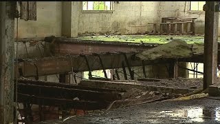 City begins demolition of old car dealerships along Wick Avenue