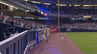 Gardner makes a leaping catch at the wall