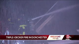 Crews battle 3-alarm fire in Dorchester