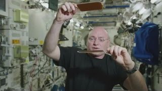 Astronaut Scott Kelly plays water ping pong on ISS