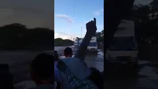 Mitsubishi fuso crossing flooded river.