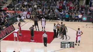 Referee blocking Kris Humphries attempt to shoot a free throw