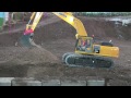 rc excavator komatsu pc 490 made by fumotec at the construction site