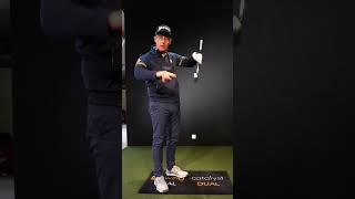 STOP hitting down at the golf ball (golf swing tips)
