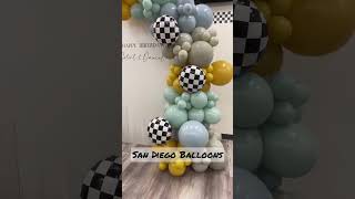 This Vintage race car themed install was for two siblings, boy and girl #balloongarland