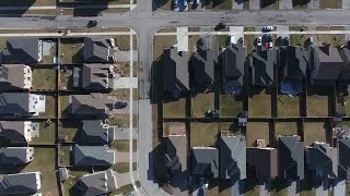 Corner Subdivision Aerial in Spring Stock Video