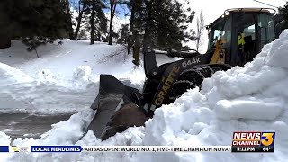 Evacuated San Bernardino County mountain residents seek to help those still trapped by snow