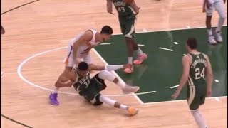 Devin Booker and Giannis Antetokounmpo get into a SCUFFLE at the end of the first quarter! 😅😅😅