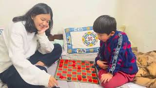 My playmate my little brother 🧑💕💕 playing checker with him ❤️