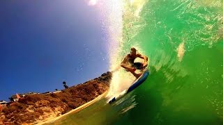 Soft top surfing video gopro stoked in slow motion Laguna Beach