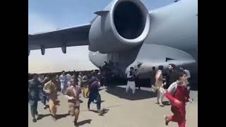 Afghan civilians cling to a USAF C-17A at #kabul #airport trying to leave country. #afghanistan